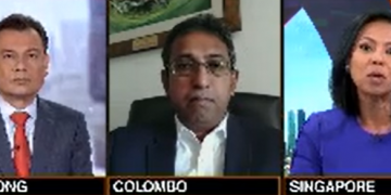 Issue is with reorganization of debt Dr Harsha de Silva says  to Bloomberg