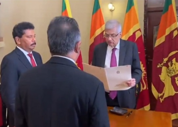 Ranil Wickremesinghe takes his oath as acting President.