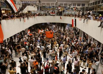 Iraqi protesters storm the parliament in Baghdad’s Green Zone