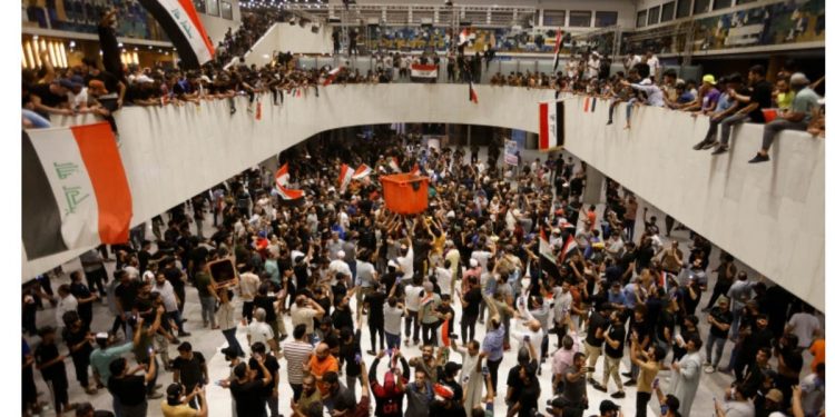 Iraqi protesters storm the parliament in Baghdad’s Green Zone