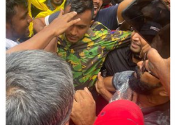 Another uniformed member of the security forces joins the protest! First to arrive was a police officer!