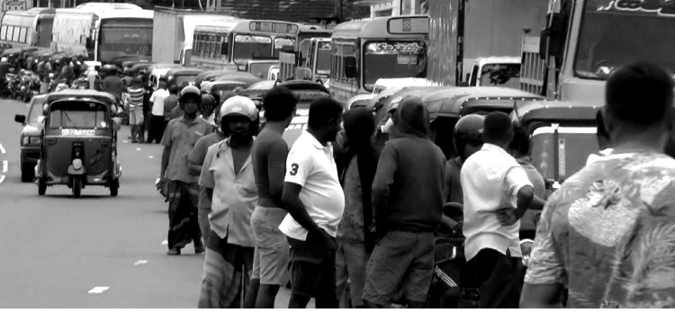 A senior citizen dies in a fuel queue, the 15th such death this year.