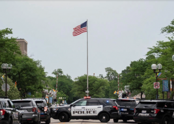 After a fatal mass shooting at a July 4 parade in a suburb of Chicago, a suspect was apprehended.