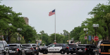 After a fatal mass shooting at a July 4 parade in a suburb of Chicago, a suspect was apprehended.