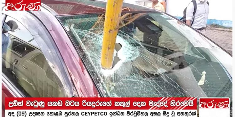 The newly built Odell building is dangerous! A pipe from above fell and shattered the glass of a vehicle in the oil queue! The driver barely makes it! Will the law not apply in these cases? (VIDEO)