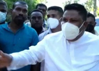 State Minister Chamara Sampath Dasanayake curses at a journalist