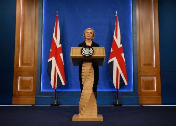 Truss wants low-tax, high-growth economy after firing finance min.