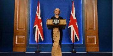 Truss wants low-tax, high-growth economy after firing finance min.