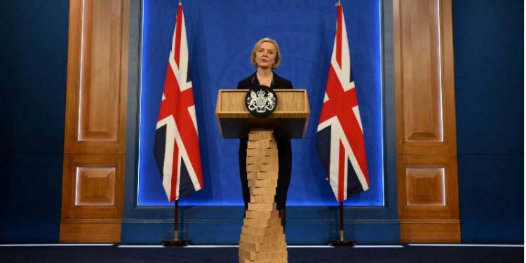Truss wants low-tax, high-growth economy after firing finance min.