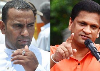 A fight breaks out inside the parliament! Chaminda Wijesiri attempts to strike Lanza! Speaker ejected Chaminda from the House! (VIDEO)