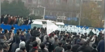 Workers at the world’s largest iPhone factory in China clash with police