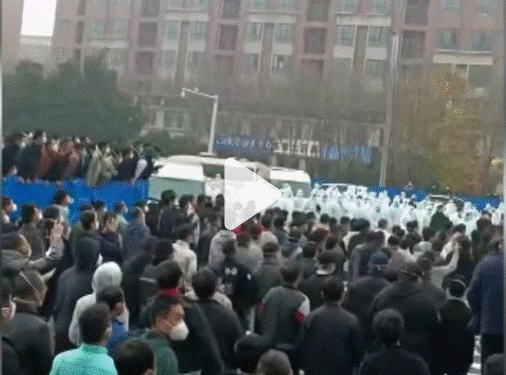 Workers at the world’s largest iPhone factory in China clash with police