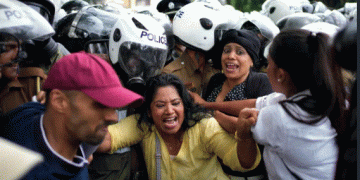 Sri Lankans rally to demand release of 2 protest leaders