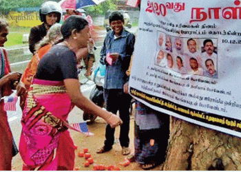 Rotten tomatoes thrown at images of Tamil politicians