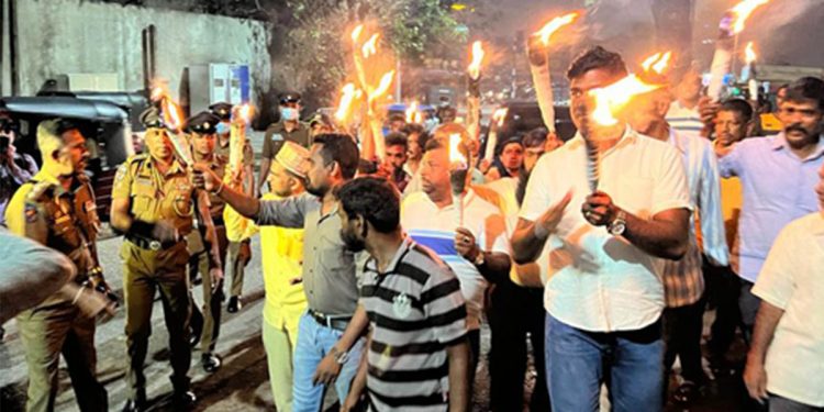 Children study for A/L exam! They turned off the power! The lotus tower’s lights have been turned on! Our children do not have any lights! A torch protest in the fort at midnight! VIDEO