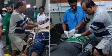 Unruly throng attacks doctor demanding life for suicide victim.