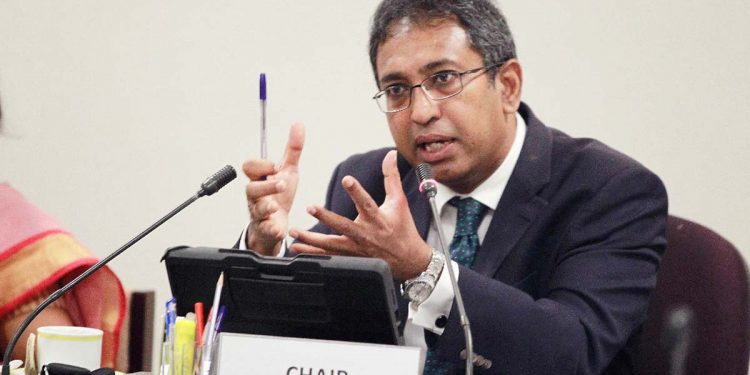 Under whose pressure is the parliament’s communication department opposing Harsha?