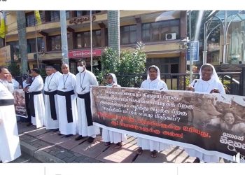 Catholic fathers are taking to the streets against the police and thugs in Maradana’s struggle! VIDEO