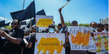 Sri Lanka outlaws strikes as anti-tax protests spread