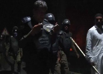 Pakistan ex-PM Khan defies arrest as supporters clash with police