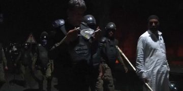 Pakistan ex-PM Khan defies arrest as supporters clash with police