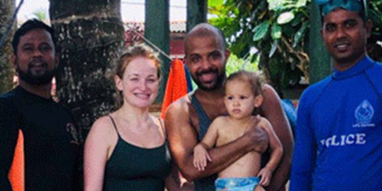 In Hikkaduwa, police lifeguards save a tourist couple and their infant child from drowning.