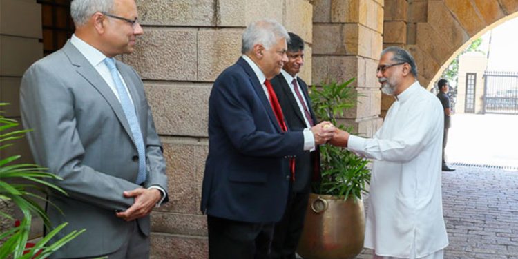 Minister of Buddha Sasana, Vidura Wickremanayake presented President Ranil with the ‘Nekath Seettuwa,’  for this year’s Sinhala and Tamil New Year.