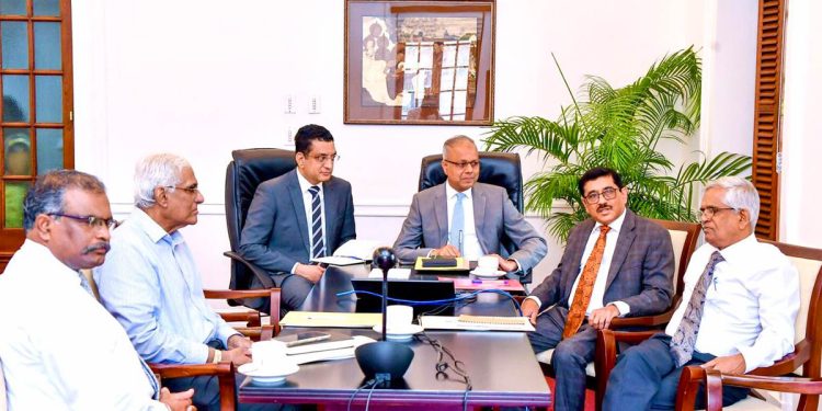 Ali Sabry, current and former CB governors, in a crucial discussion with Sagala about credit restructuring.