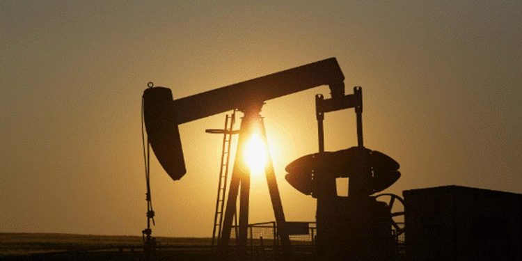 Oil edges higher as tighter supply looms, growth concerns weigh