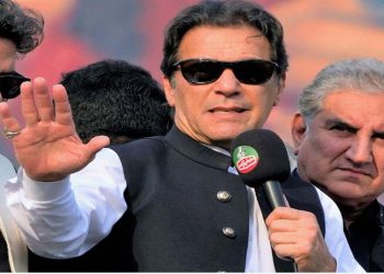 Former Pakistan cricket captain and Prime Minister Imran Khan arrested by paramilitary officers outside the High Court in Pakistan.