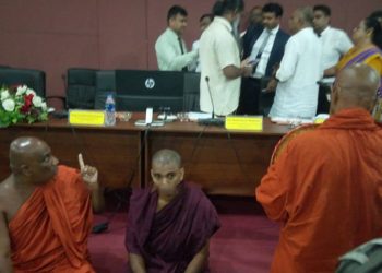 Protesting monks forced themselves into District development council meeting and got revoked orders preventing  rehabilitation work of Boralukande viharaya I Sri Lanka Latest News