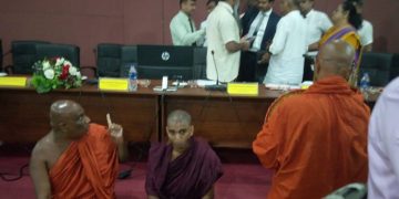 Protesting monks forced themselves into District development council meeting and got revoked orders preventing  rehabilitation work of Boralukande viharaya I Sri Lanka Latest News
