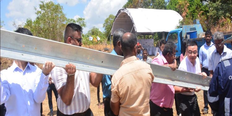 Ceylon Energy marking the first tower erection under the SESRIP-P4 electricity supply enhancement project I Sri Lanka Latest Business News