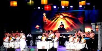 ComBank employees celebrate Poson with ‘Pahan Gee’
