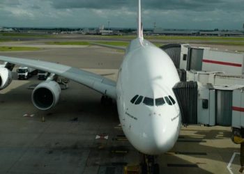 Planes grounded as mass worldwide IT outage hits airlines, media and banks