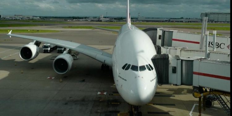 Planes grounded as mass worldwide IT outage hits airlines, media and banks