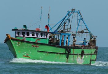 Sri Lankan Navy Detains Twelve Indian Fishermen for Violating Maritime Boundaries Near Point Pedro