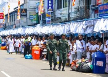 Over 400,000 Gather for ‘Siri Dalada Vandana’: Police Deploy Special ID System, Urge Public to Avoid Kandy