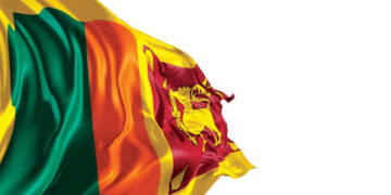 National Flag Displayed at Start of PUCSL Press Conference on Electricity Tariff Hike