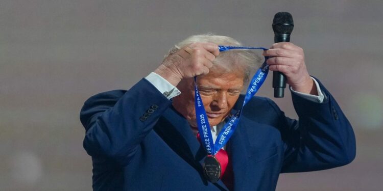 Peace medal and YMCA: Trump steals the show at World Cup draw